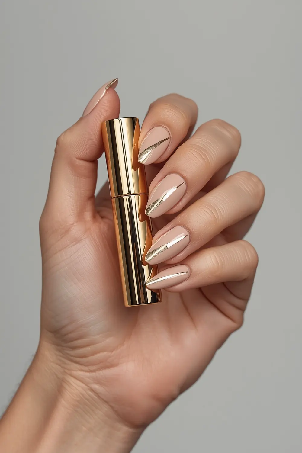 10. Minimalist Gold Chrome Lipstick Nails