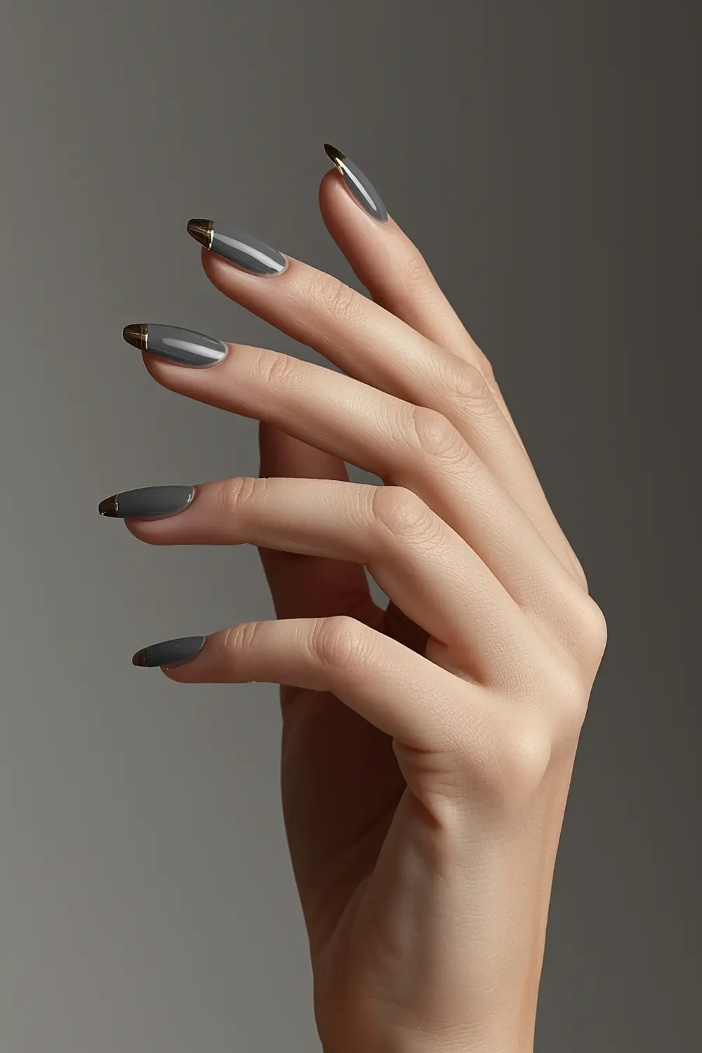 6. Graphite & Gold: Sleek Metallic French