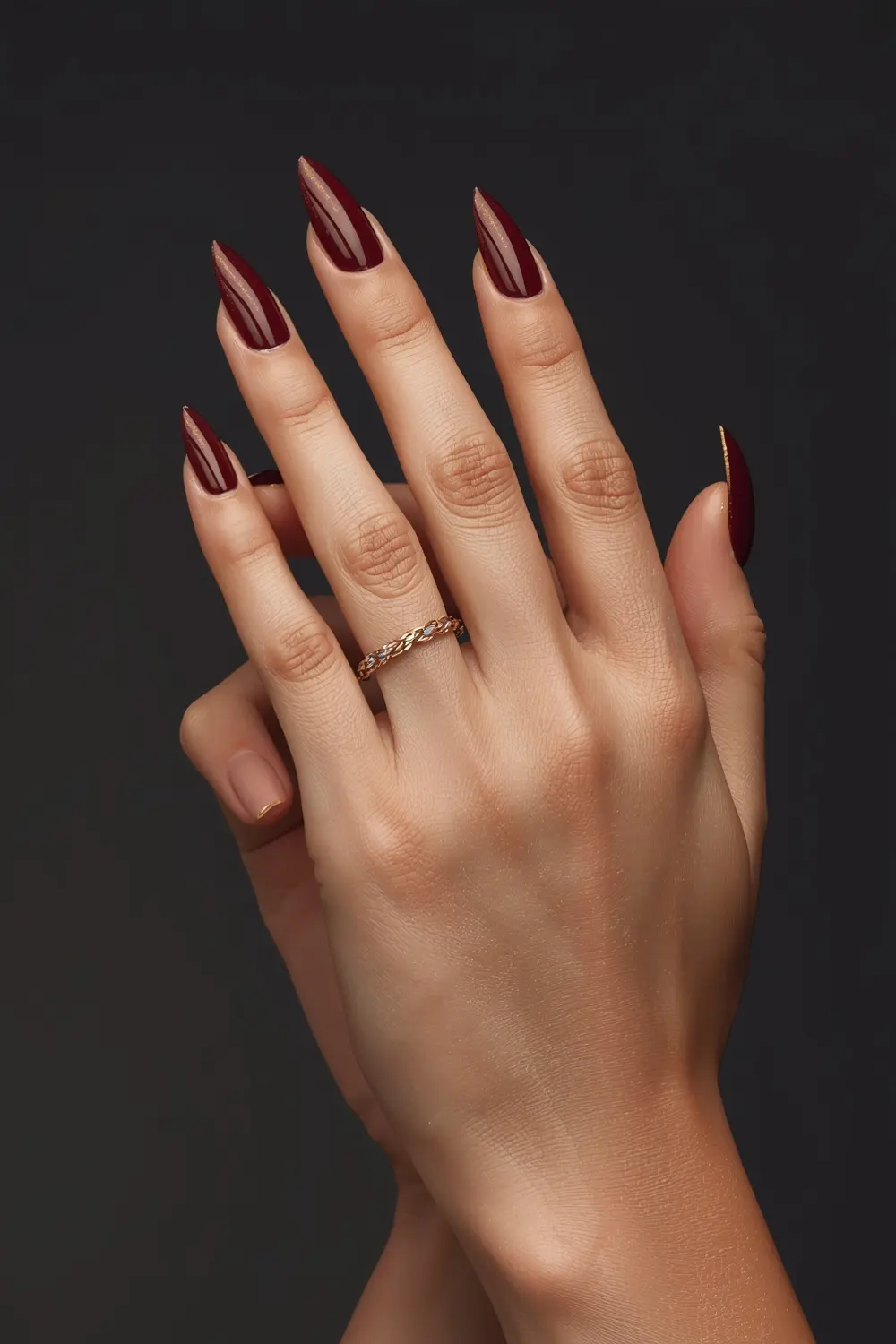 9. Chrome-Tipped Almond Stilettos